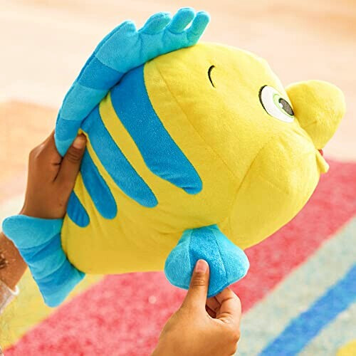 Peluche Poisson jouet officiel disney la petite sirène : soyez assuré de l'authenticité de votre jouet polochon lorsque vous l'achetez sur le disney store variant 1 